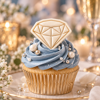 XS diamond fondant cupcake topper on blue icing for wedding or anniversary celebration