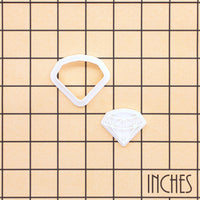 XS diamond mini cookie cutter and stamp shown on inch measurement grid