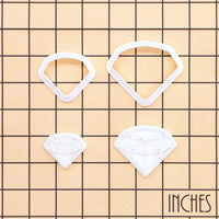 Diamond Mini and XS outline cutters and detail stamps shown together on inch measurement grid