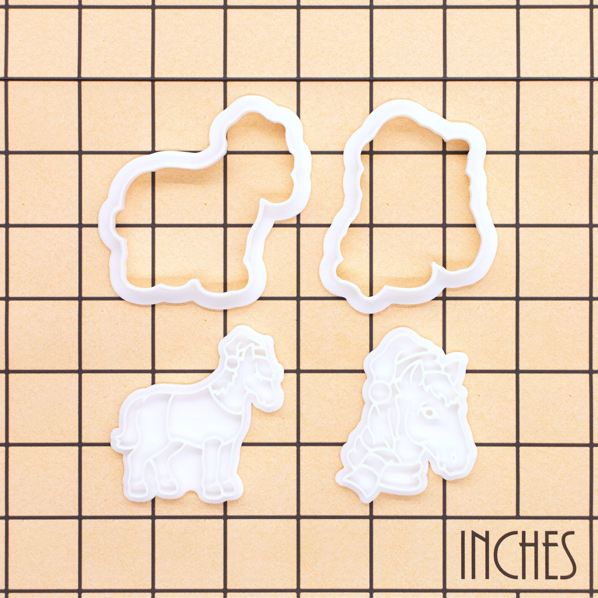 Set of 2 Christmas horse mini outline cutters and detail stamps on inch measurement grid