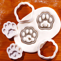 Cute and realistic kitty paw mini cookie cutter and stamp set of 2 with detailed cat paw impressions in fondant