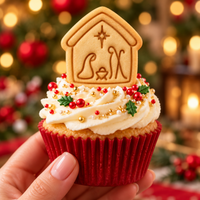 Mini Nativity scene cookie with Mary Joseph and baby Jesus used as a Christmas cupcake topper
