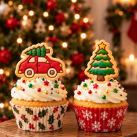 Decorated Christmas tree on car and Christmas tree cookies on festive cupcakes for Xmas party baking