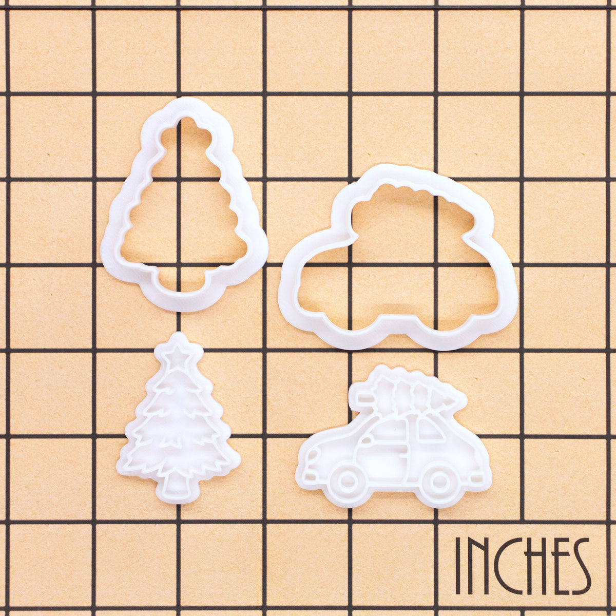 Christmas tree on car and Christmas tree mini cookie cutters and stamps shown on inch measurement grid