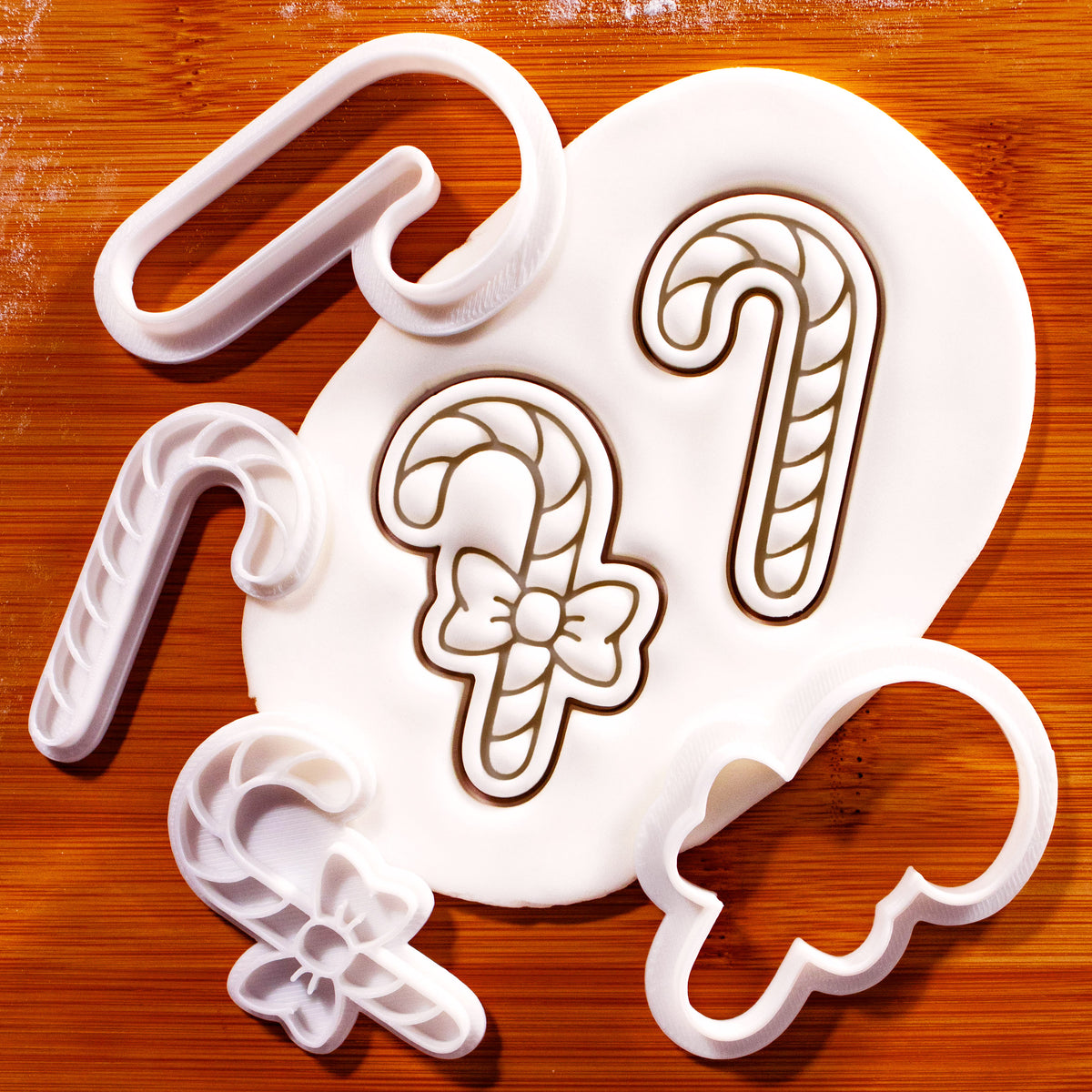 Christmas candy cane and candy cane with bow mini cookie cutter and stamp set with embossed sugarpaste impressions