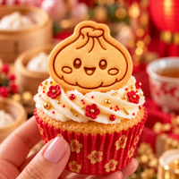 Cute smiling Xiao Long Bao dumpling biscuit used as cupcake topper for Chinese New Year baking