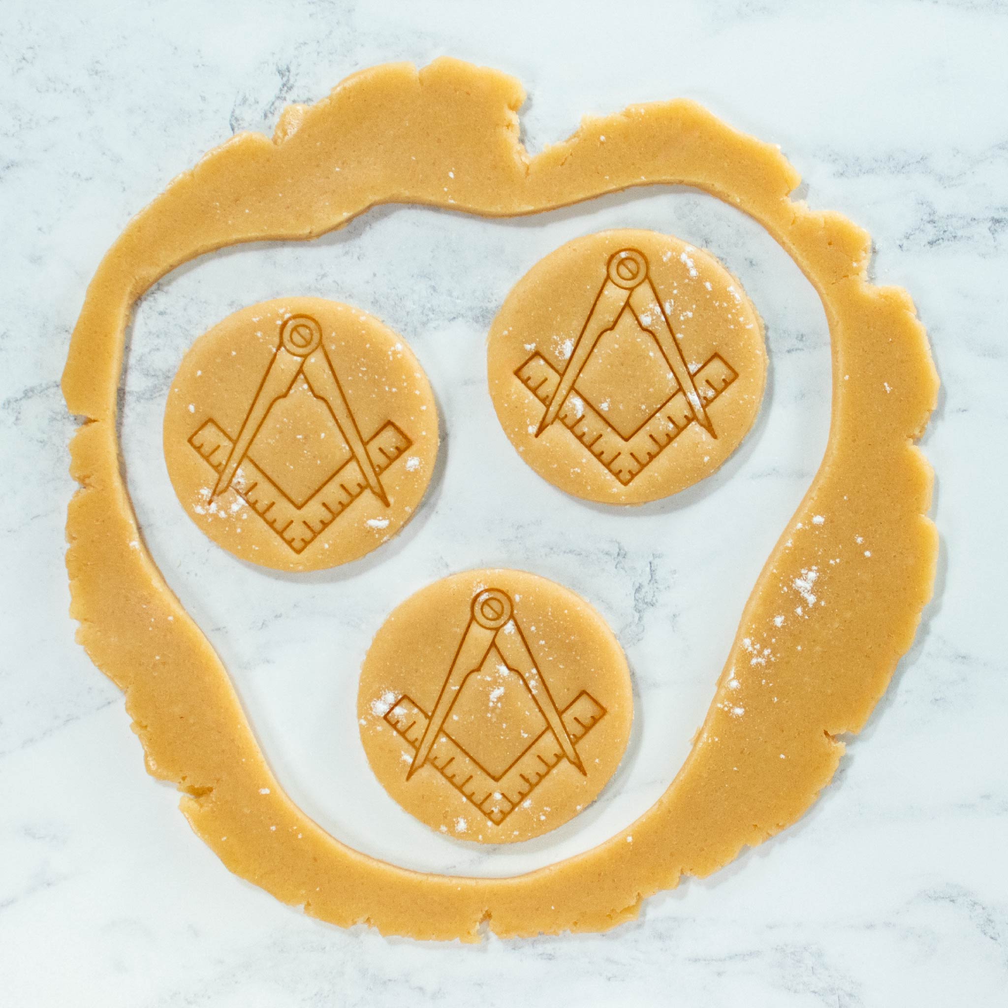 Bakerlogy Masonic Compass Cookie cutout dough