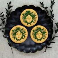 medusa cookies colored with royal icing made with bakerlogy medusa cookie cutter