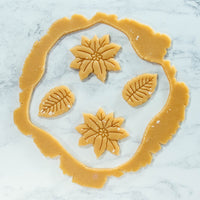 Bakerlogy Poinsettia Flower and Leaf cookie cutout dough