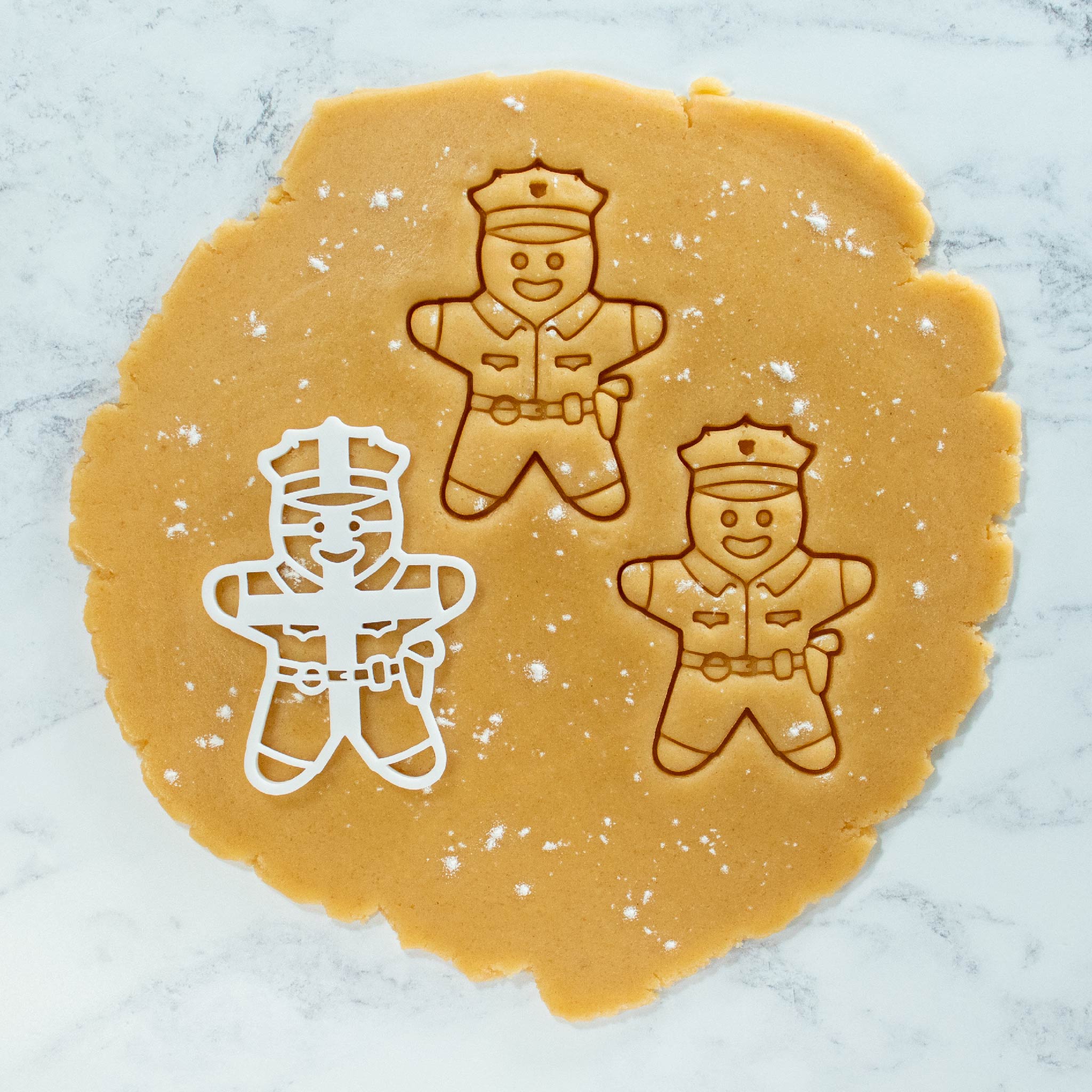 Police officer cookies cutout dough made with bakerlogy police officer cookie cutter