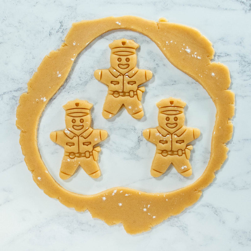 Police officer cookies cutout dough made with bakerlogy police officer cookie cutter