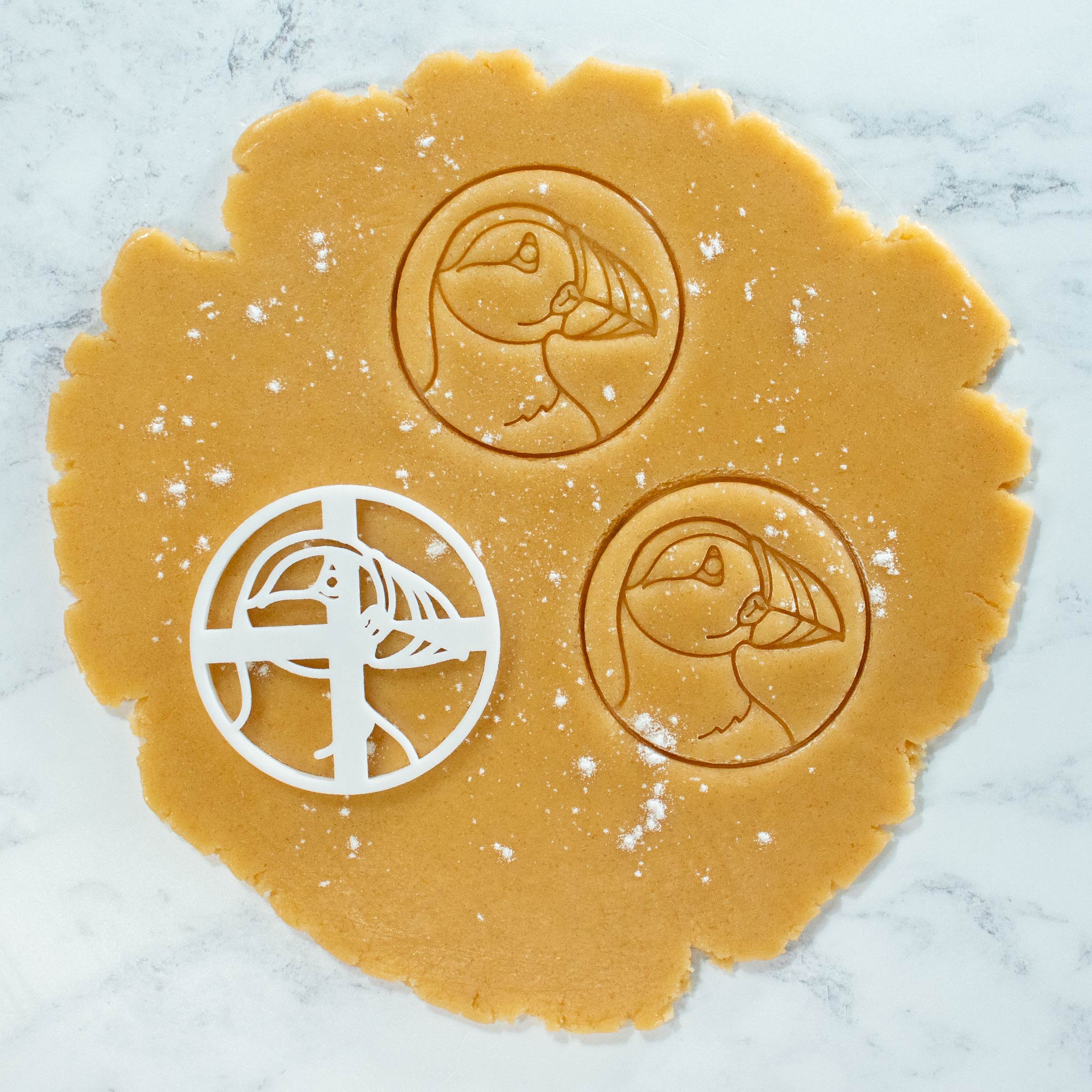 BAKERLOGY Puffin cookie dough cutouts with puffin cookie cutter