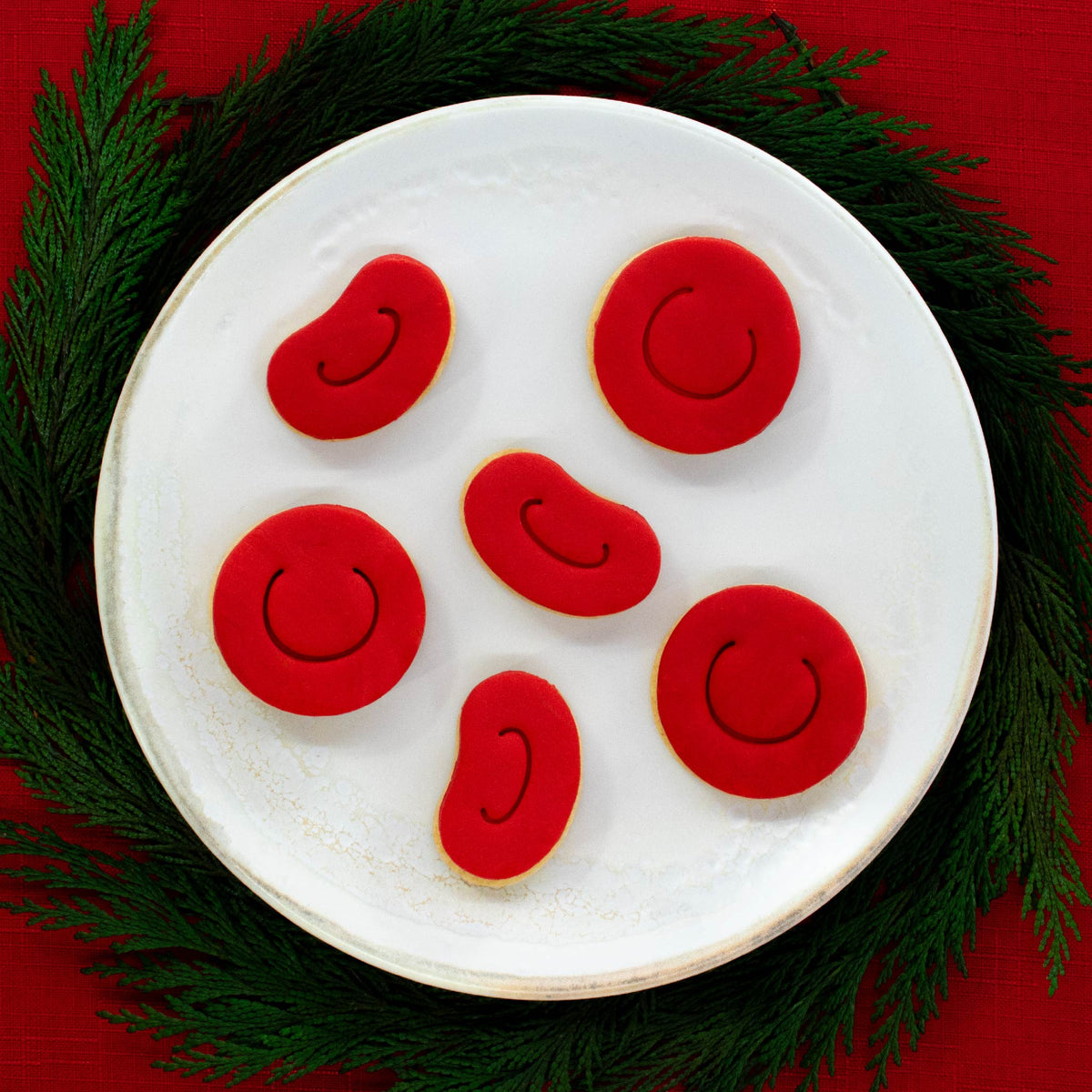 red blood cell fondant toppings on cookies made with bakerlogy red blood cell cookie cutters
