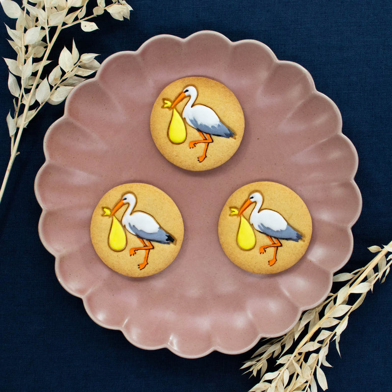 bakerlogy stork with baby cookies decorated with royal icing