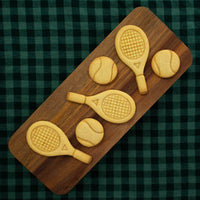 bakerlogy tennis racket and ball sugar cookies