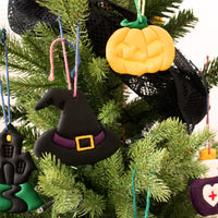 halloween witch hat clay ornament on christmas tree