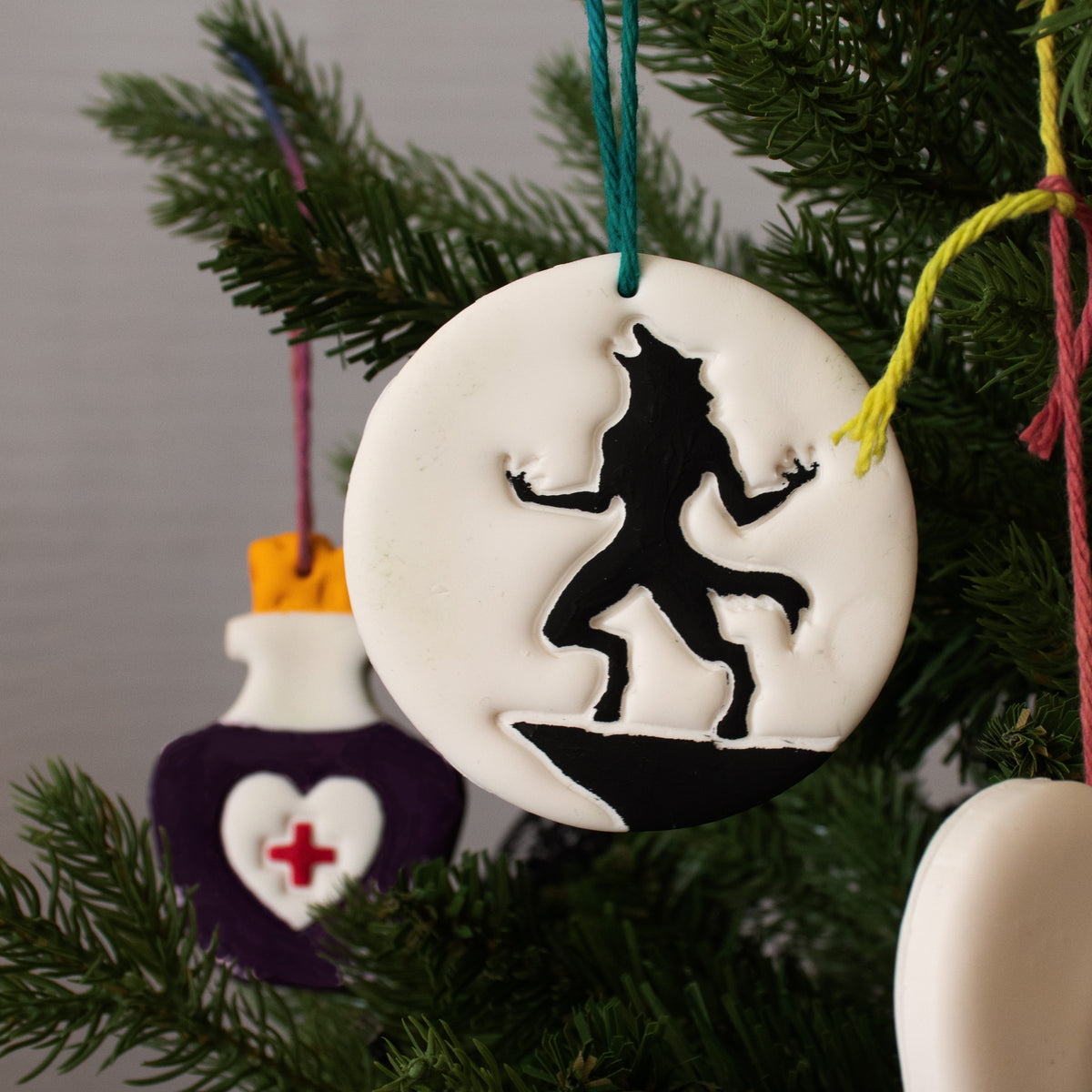 halloween werewolf clay ornament on christmas tree