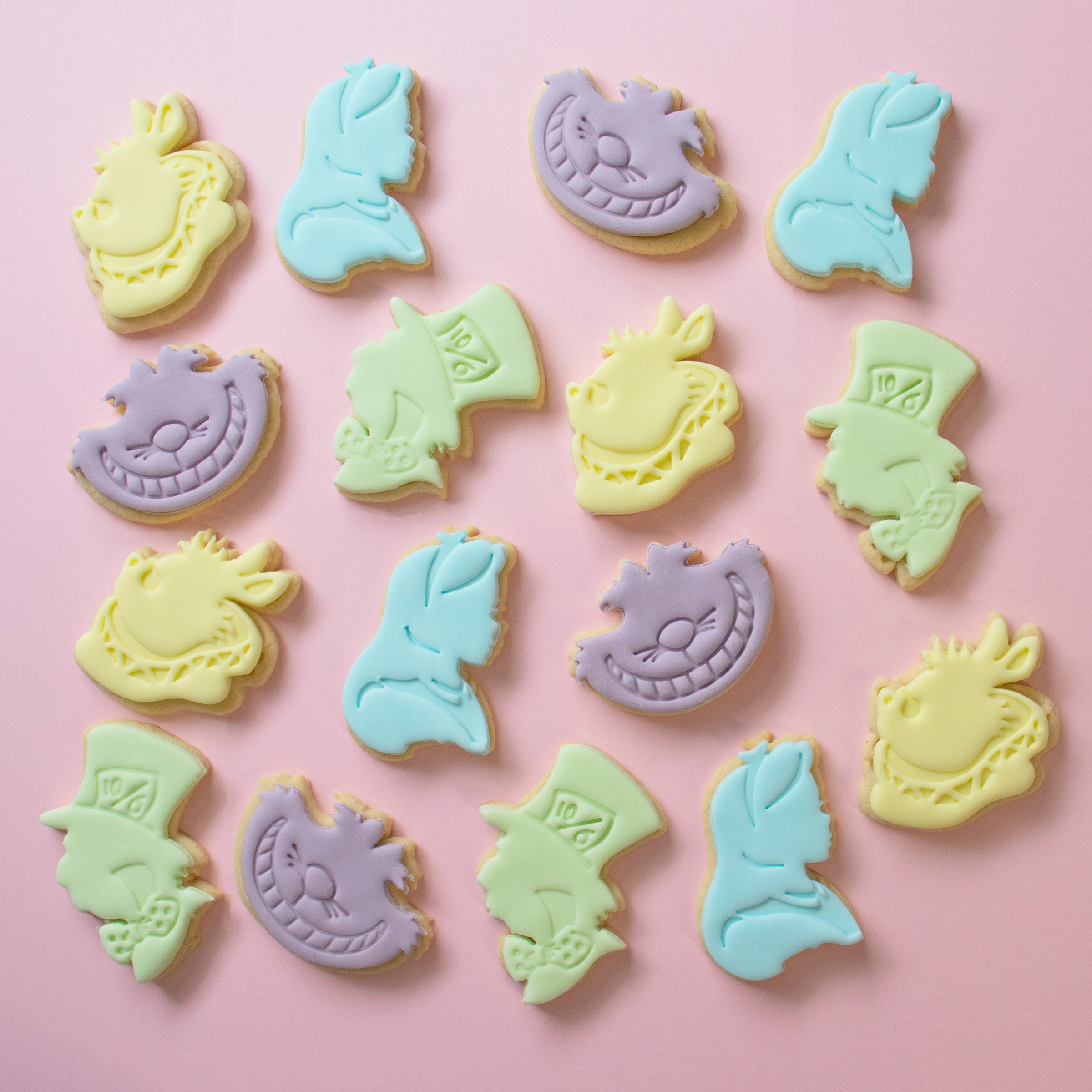set of 4 alice's adventures in wonderland characters cookies with fondant - alice kingsley, mad hatter, cheshire cat, white rabbit