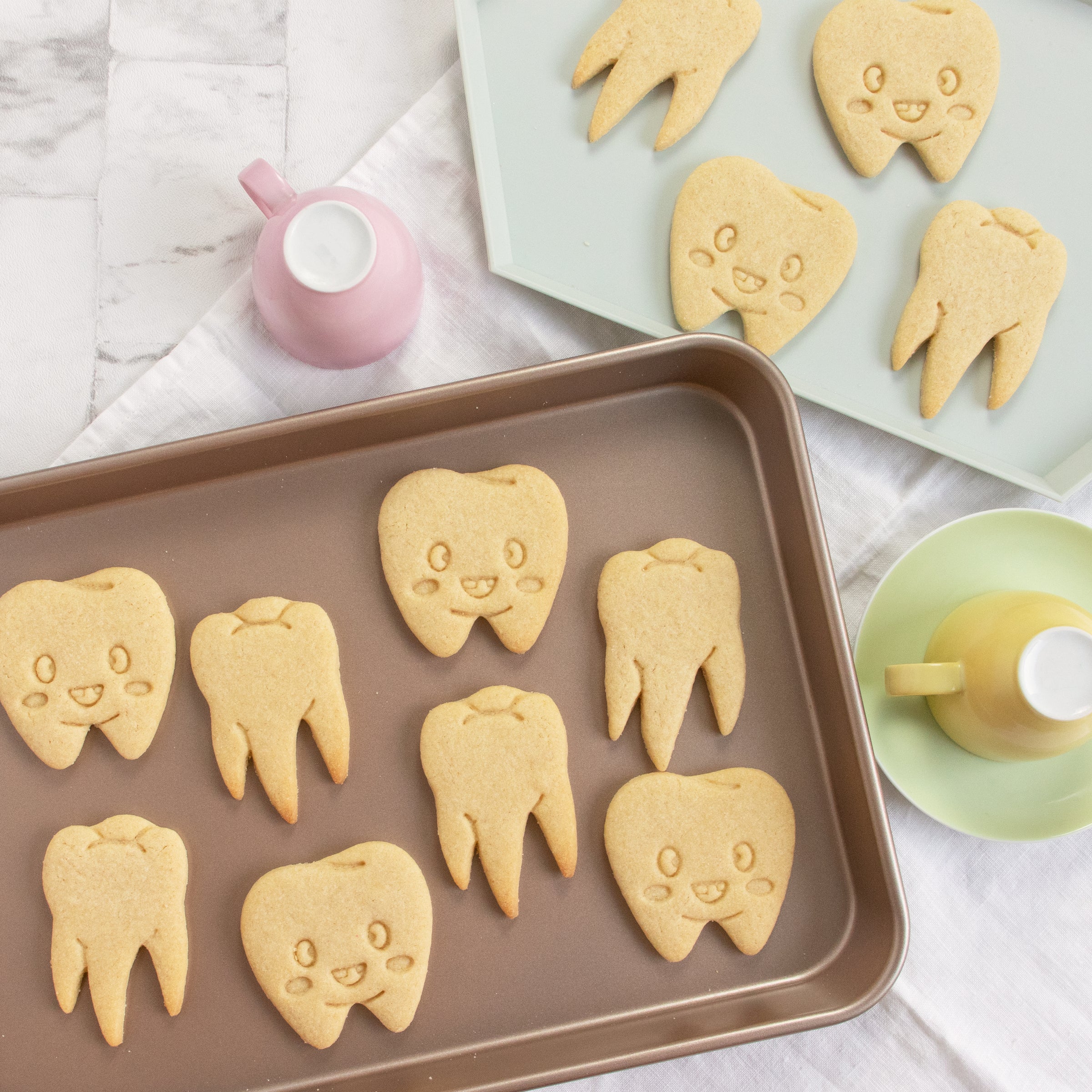 cute tooth and realistic tooth cookies
