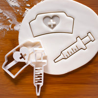 set of 2 cookie cutters: nurse hat and syringe