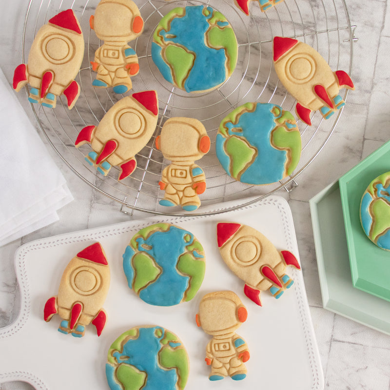 set of 3 space themed cookies: Astronaut, earth and rocket