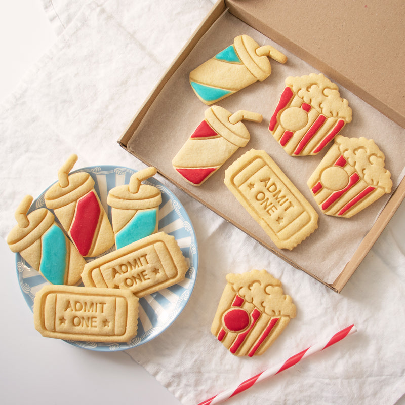 set of 3 cookie cutters, featuring popcorn, admit one ticket and soft drink cookies