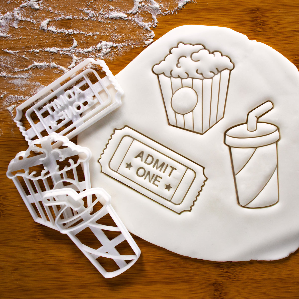 set of 3 cookie cutters, featuring popcorn, admit one ticket and soft drink cookie cutters