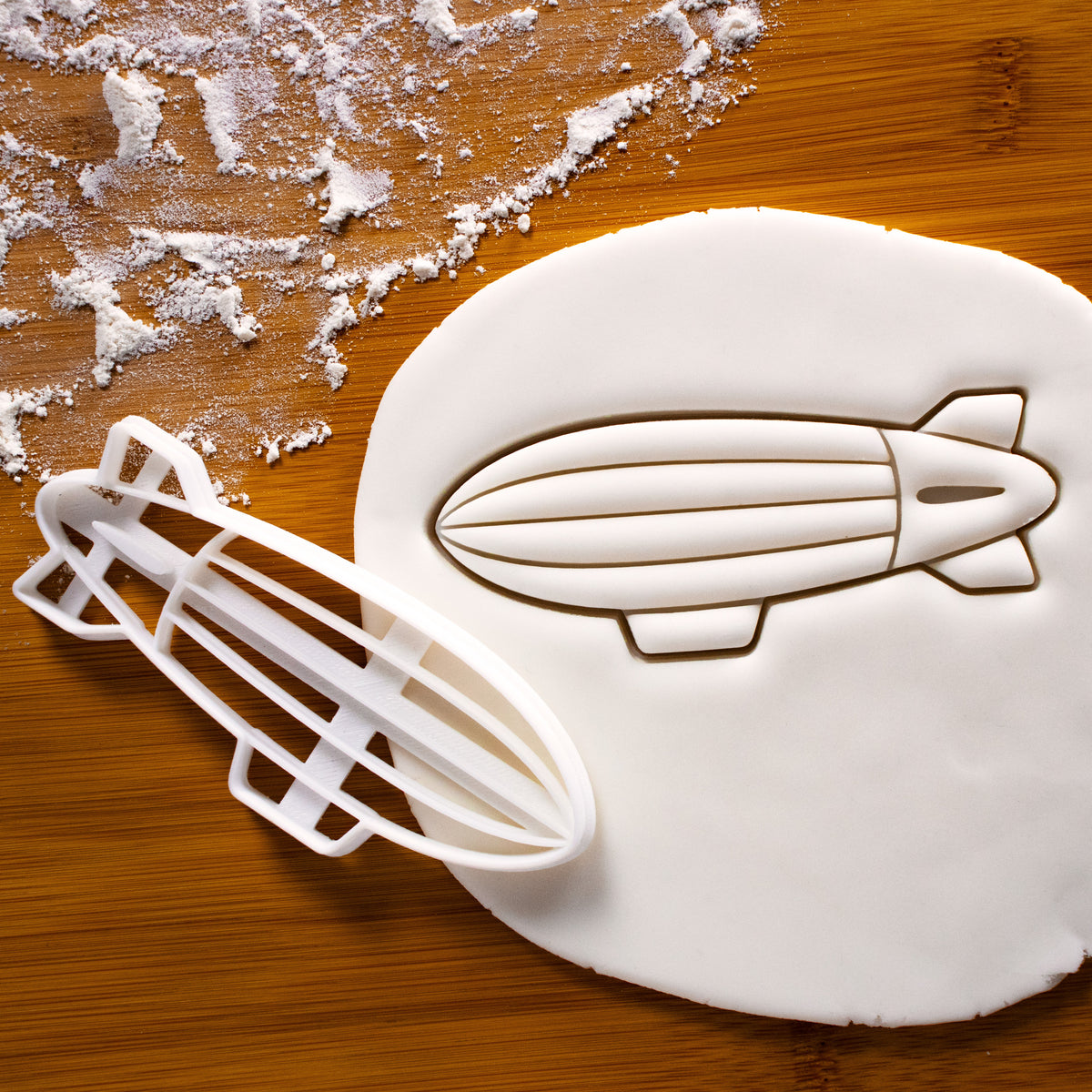 Blimp cookie cutter pressed on fondant