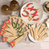 set of 4 hand tools cookies, featuring a hammer, a hand saw, a wrench and a pair of pliers