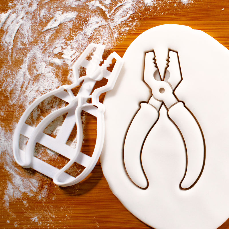pliers cookie cutter pressed on fondant