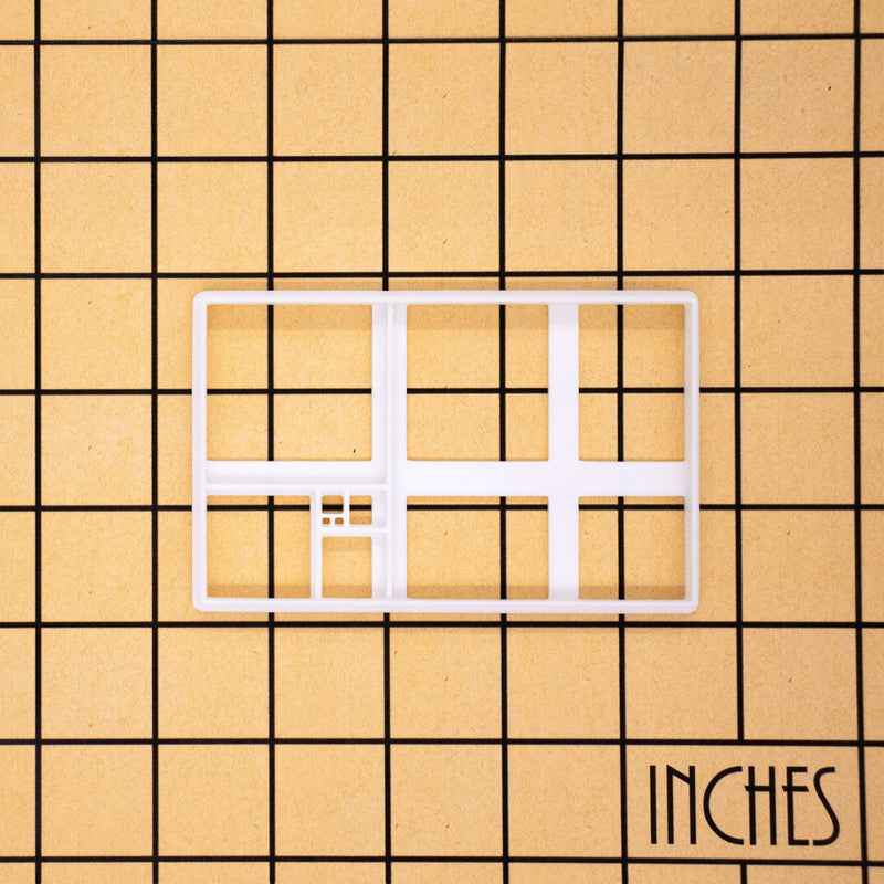 fibonacci tiling (golden ratio) cookie cutter pressed on white fondant