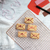 love letter envelope cookies on a tray