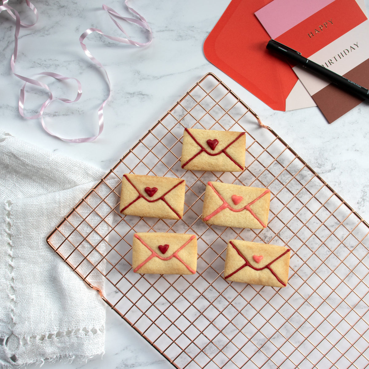 love letter envelope cookies on a tray