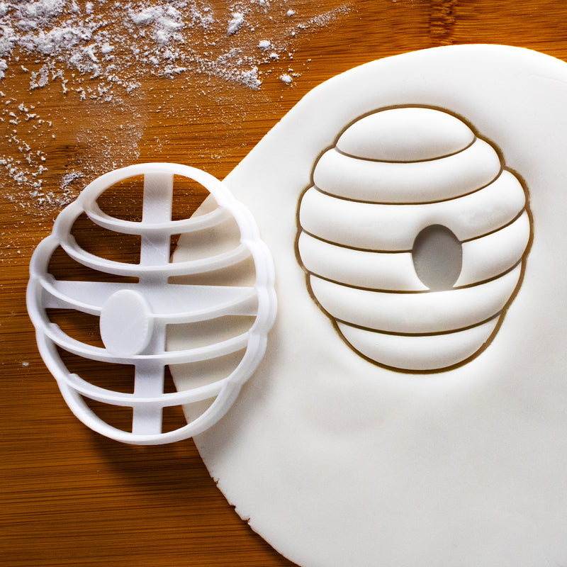 Beehive cookie cutter pressed on white fondant