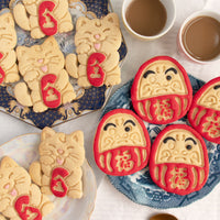 lucky cat and daruma doll cookies