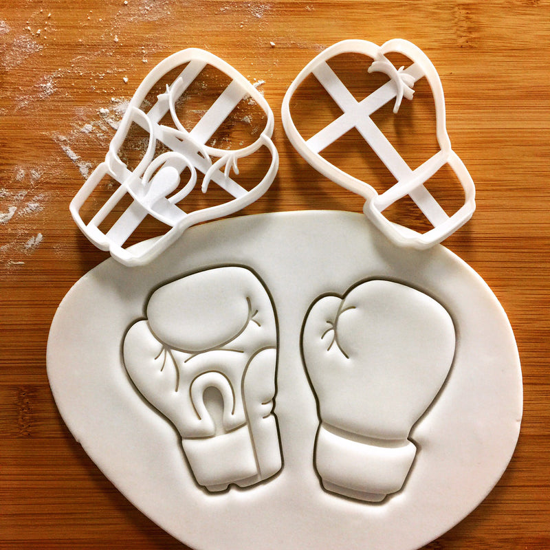 set of 2 boxing gloves cookie cutters, featuring front view and palm view