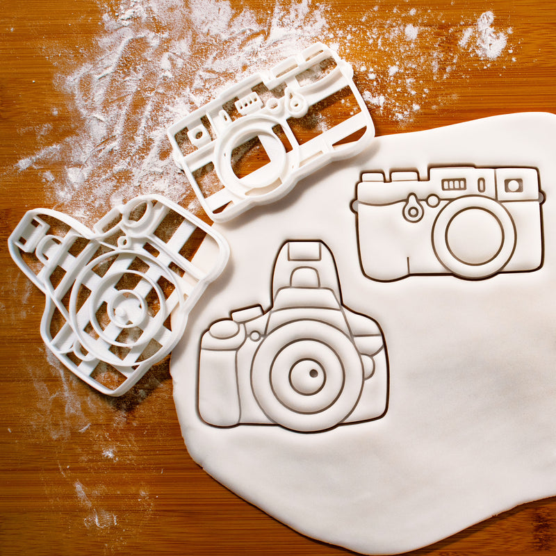 set of 2 camera cookie cutters, featuring a dslr and a slr camera