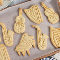 Harp, violin, piano, saxophone cookies