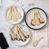 set of 3 guitar cookies, including bass guitar, electric and acoustic guitars