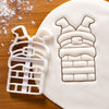 Santa Claus Stuck in the Chimney Cookie Cutter pressed on white fondant