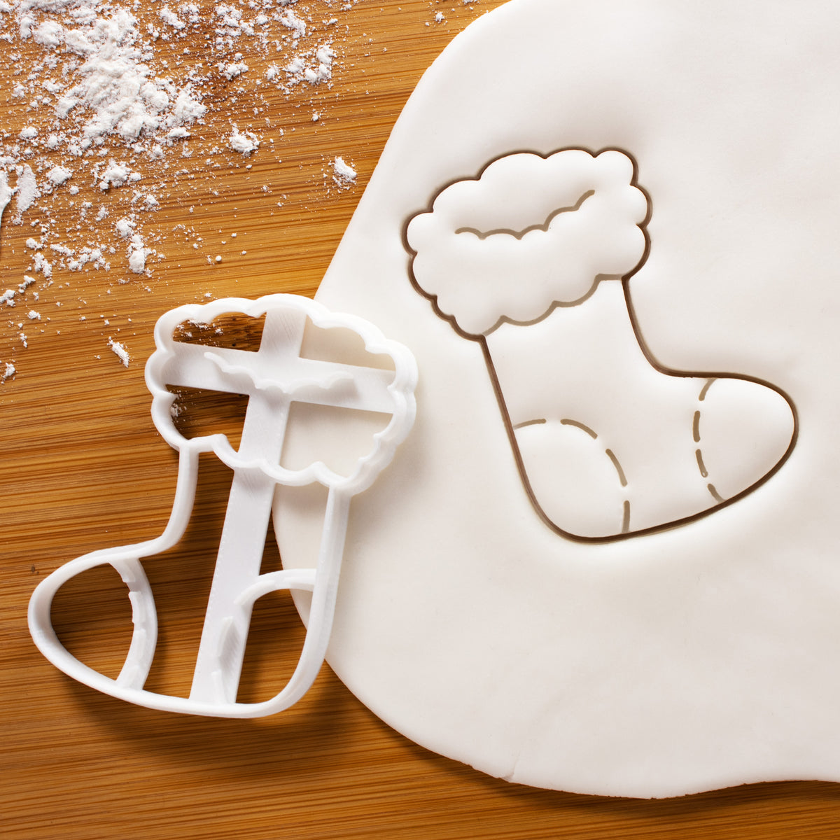 Christmas Stocking Cookie Cutter pressed on white fondant