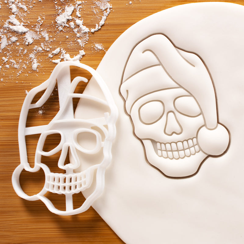 santa claus skull cookie cutter pressed on white fondant