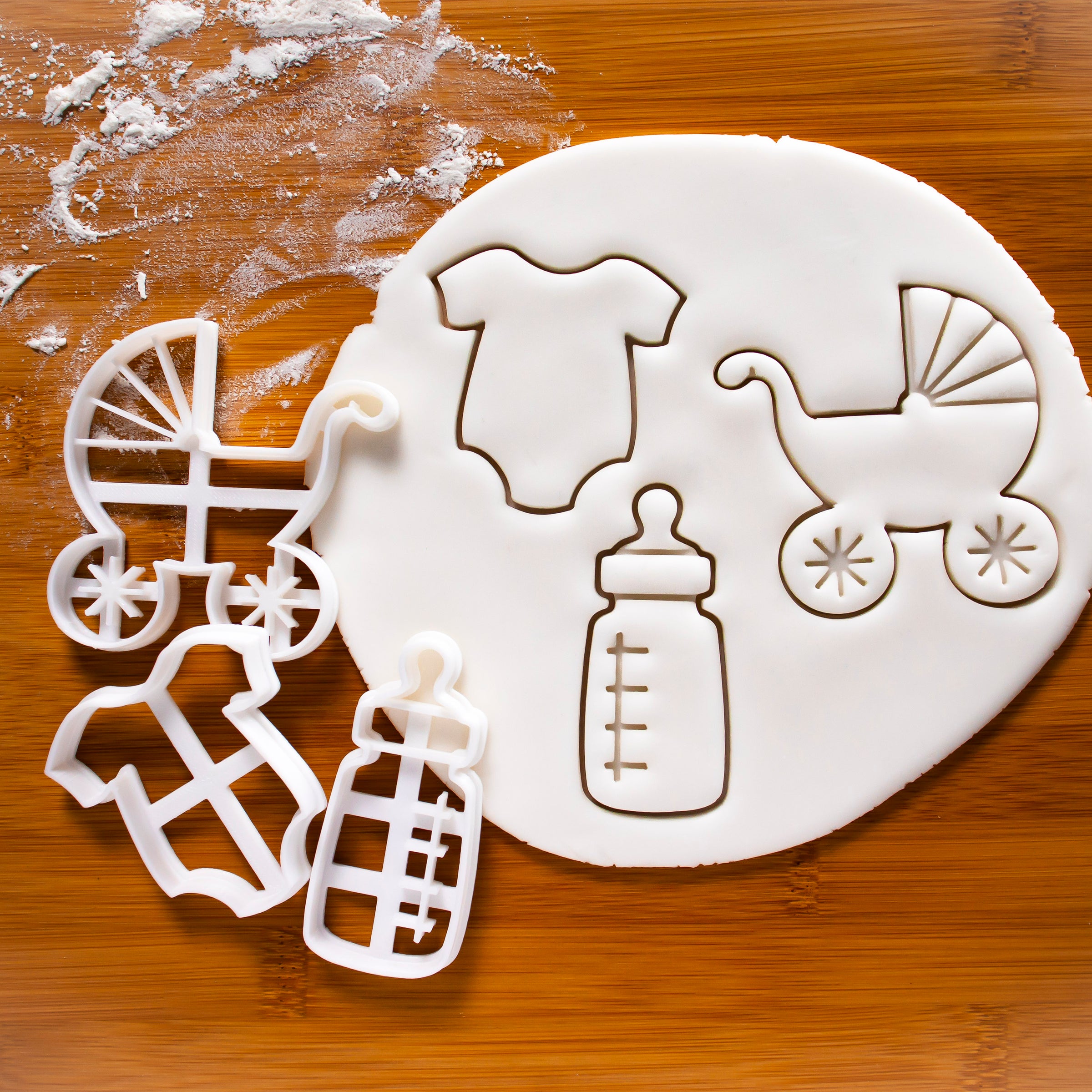 set of 3 baby shower cookie cutters: Baby pram, baby bottle, and baby clothes cookie cutters