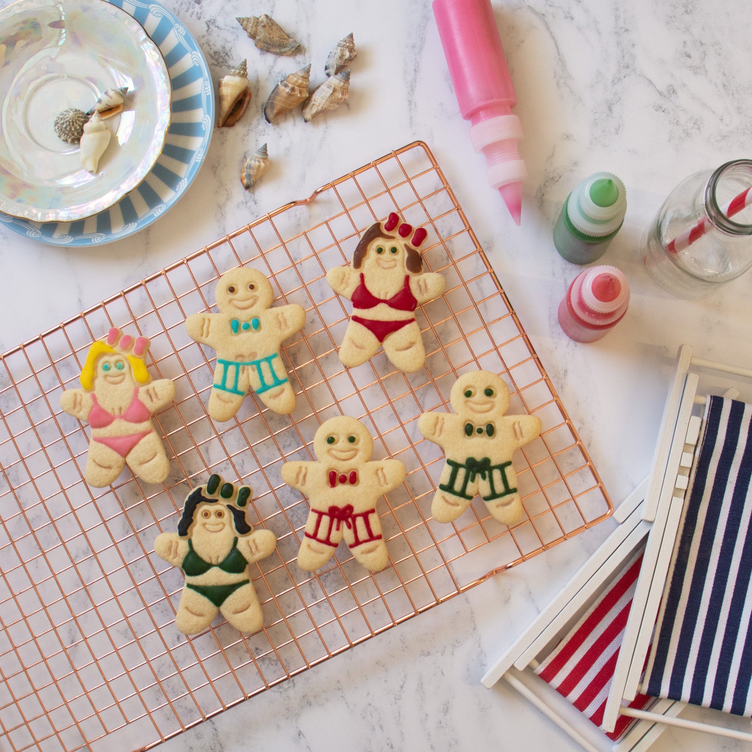 summer gingerbread man and woman in bikini and summer shorts cookies