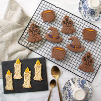 Set of 4 Witchcraft themed Cookies: Candle, Witch Hat, Cauldron, and Haunted House