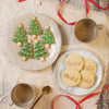 christmas tree and santa claus on reindeer sleigh cookies