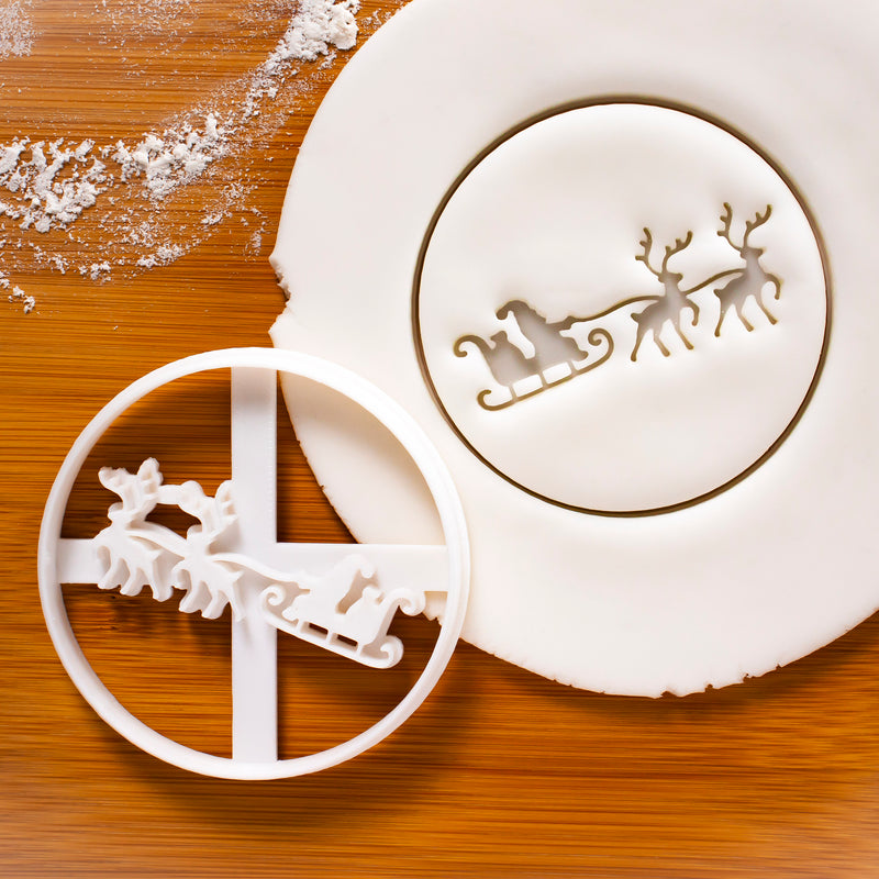 santa claus and reindeer sleigh cookie cutter