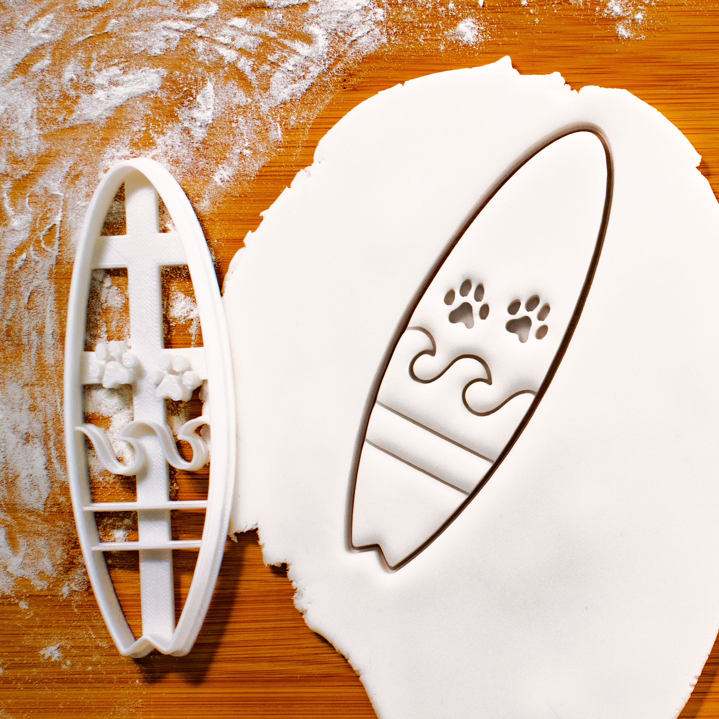 surfboard with paw prints cookie cutter