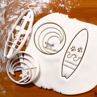 surfer dog and surfboard with paw prints cookie cutters