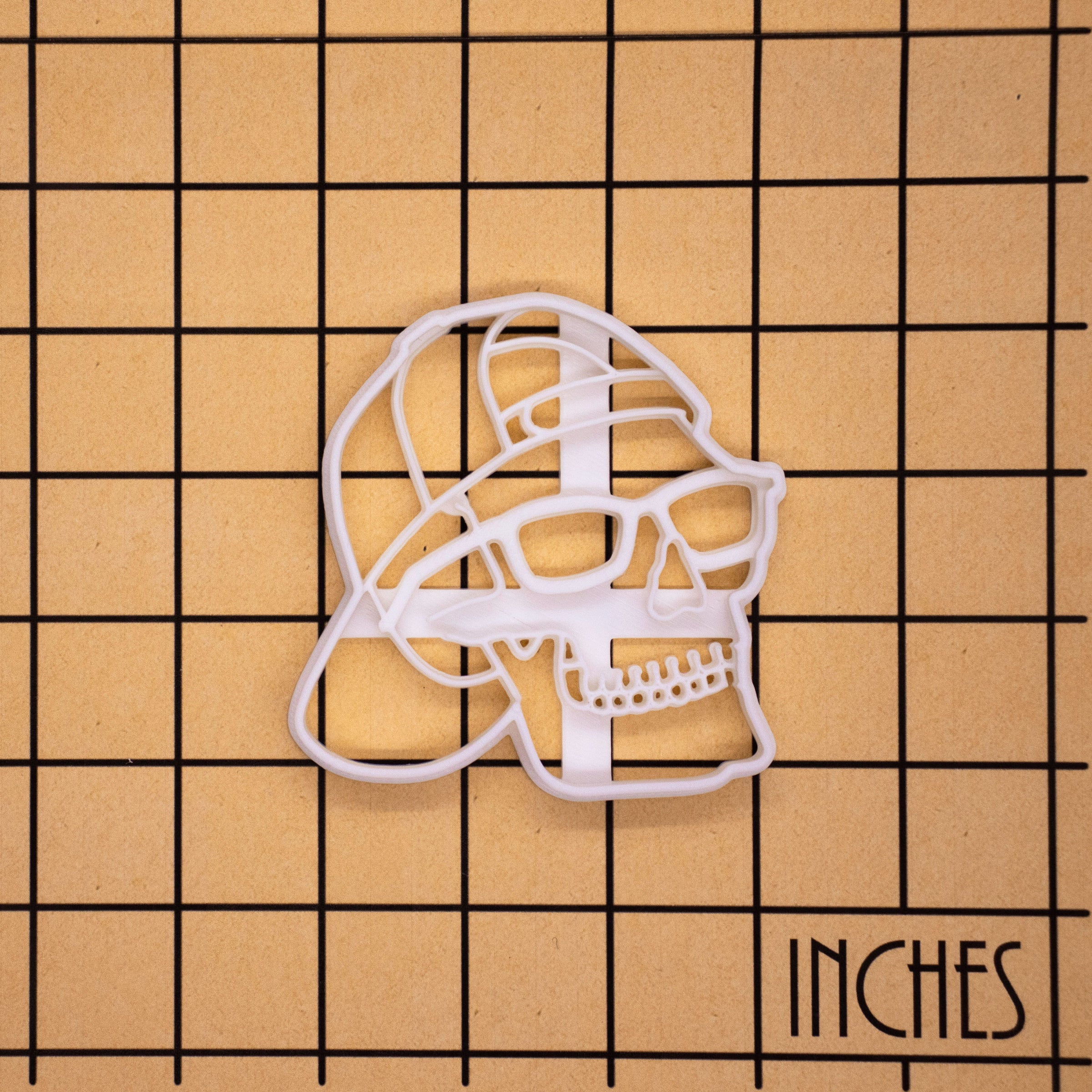 Skull with cap and sunglasses cookie cutter